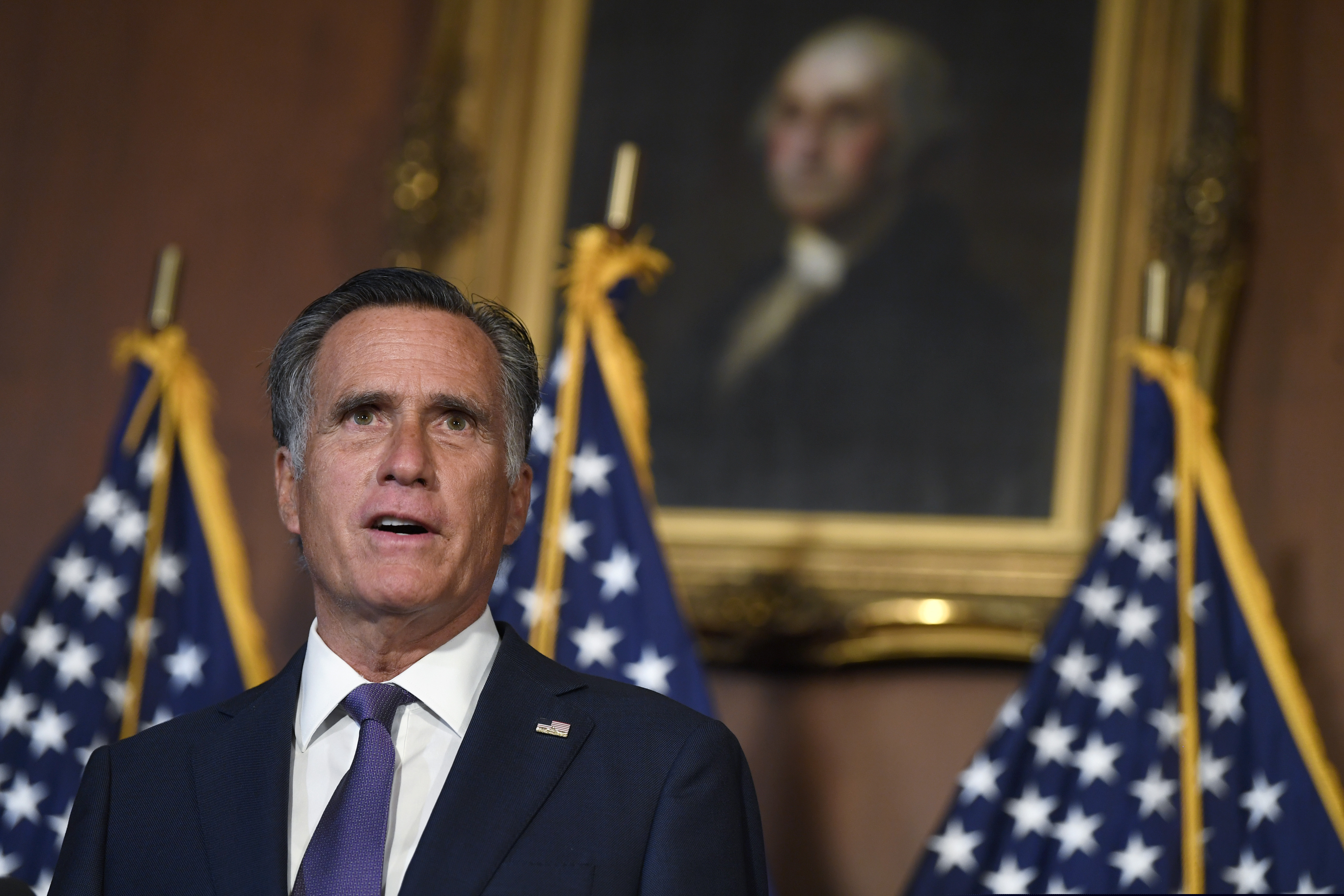 (Susan Walsh | AP file photo) Sen. Mitt Romney, R-Utah, speaks during a news conference on on Capitol Hill on July 27, 2020.