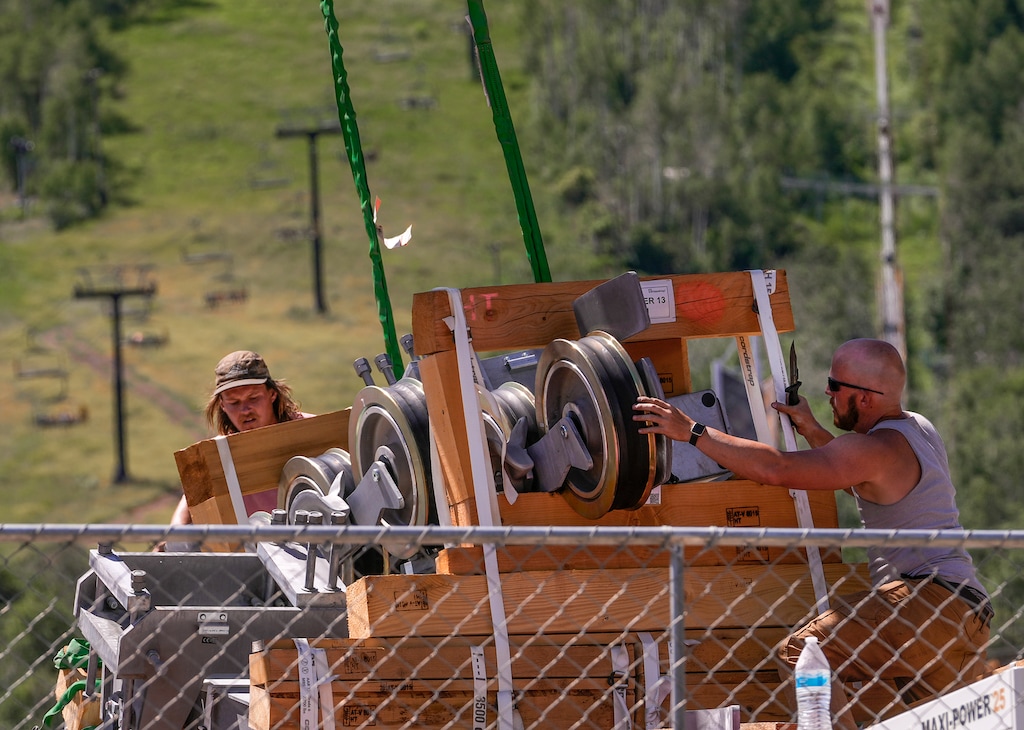 (Leah Hogsten | The Salt Lake Tribune) Park City Mountain employees move parts designated for the resort's  new Eagle lift, Thursday, July 7, 2022.  On Jan. 27, 2026, less than a year after courts upheld the Park City Planning Commission's decision to deny an administrative permit for the lift, resort officials filed a new permit request to upgrade the lift.