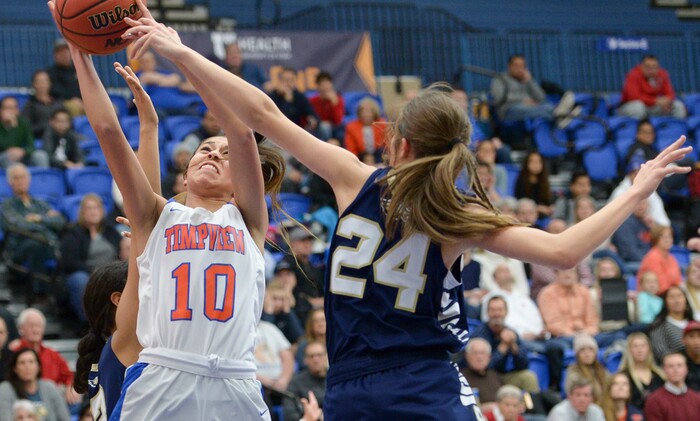 (Leah Hogsten  |  The Salt Lake Tribune) Timpview's Jasmine Espinoza (10) is fouled by Skyline's Kate Vorwaller (24).  Timpview faces Skyline in their semifinal game of the 5A High School Girls' Basketball Tournament at SLCC in Taylorsville, Friday, Feb. 23, 2018. 