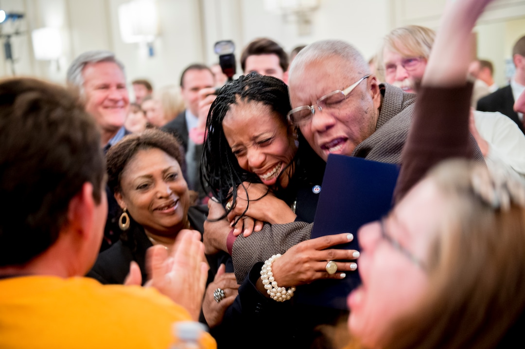(Jeremy Harmon | The Salt Lake Tribune) Mia Love gets a hug from her father after she beat opponent Doug Owens in the race for Utah's 4th Congressional District, Tuesday Nov. 4, 2014.