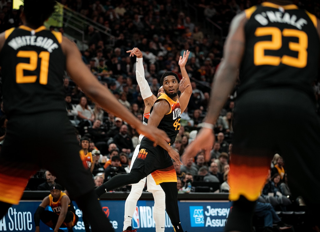 (Rachel Rydalch | The Salt Lake Tribune) Utah Jazz guard Donovan Mitchell (45) closes out on Portland Trail Blazers shooter in NBA action between the Utah Jazz and the Portland Trail Blazers in the Vivint Arena on Wednesday, March 9, 2022.