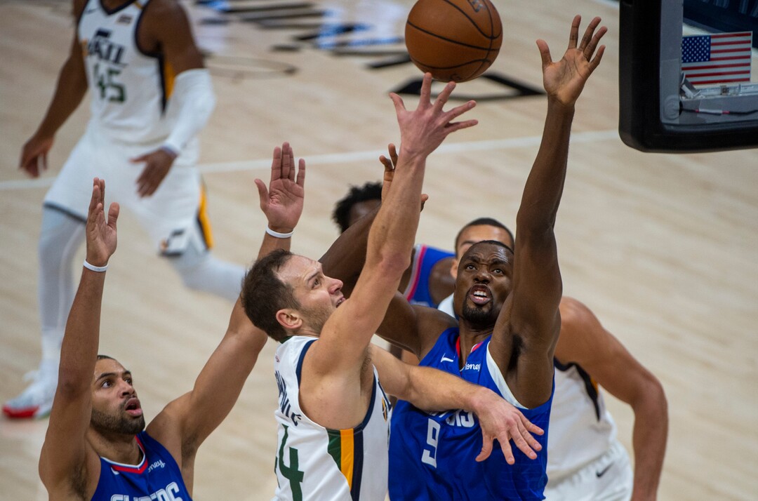 (Rick Egan | The Salt Lake Tribune) Utah Jazz forward Bojan Bogdanovic (44) takes the ball inside as LA Clippers forward Serge Ibaka (9) defends, in NBA action between the Utah Jazz and the LA Clippers at Vivint Arena, on Friday, Jan. 1, 2021.