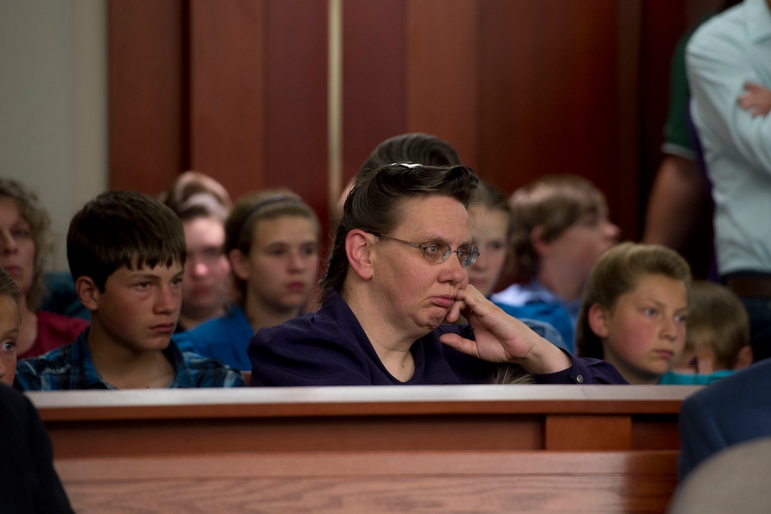 (Jeremy Harmon  |  The Salt Lake Tribune) Members of the FLDS church listen during a UEP hearing in Salt Lake City on Tuesday, June 18, 2019. 