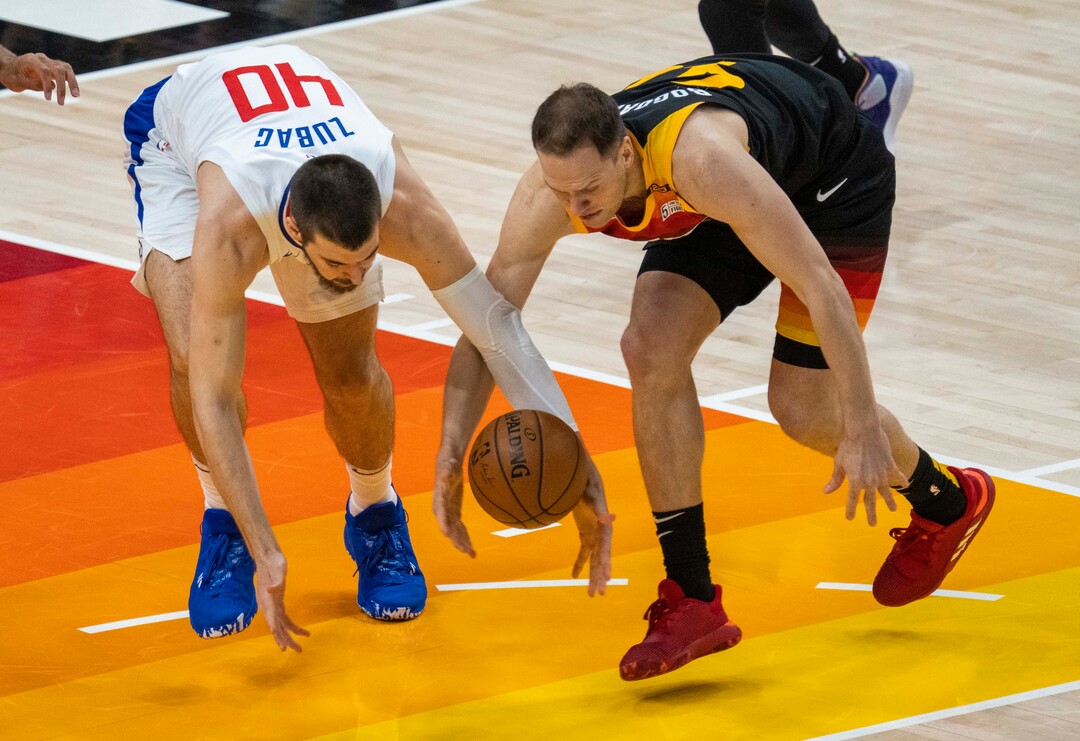 (Rick Egan | The Salt Lake Tribune) Utah Jazz forward Bojan Bogdanovic (44) knocks the ball out of the hands of LA Clippers center Ivica Zubac (40) during Game 2 of the Western Conference Semifinals at Vivint Arena, on Thursday, June 10, 2021.