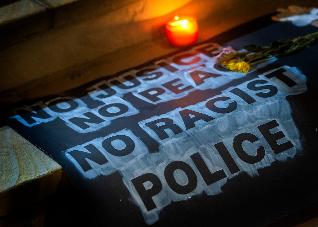 (Rick Egan  |  Tribune file photo)    Posters, flowers and candles line the steps of the Salt Lake City and County Building late at the evening after all the protesters were gone, Wednesday, June 3, 2020.