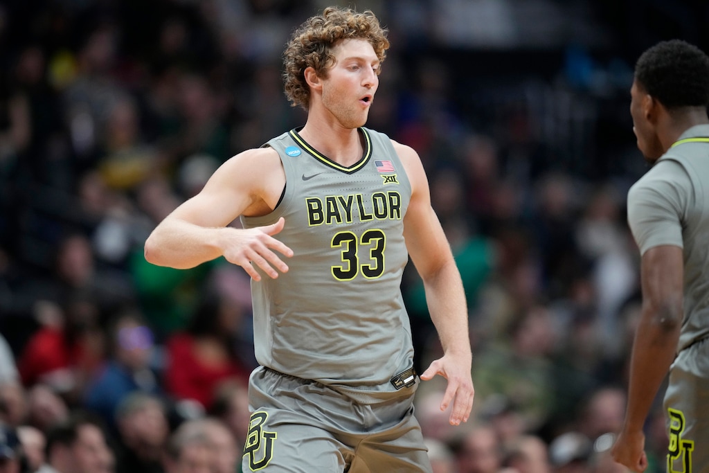 Baylor forward Caleb Lohner, left, celebrates after hitting a 3-point basket with guard Dale Bonner in the second half of a first-round college basketball game against UC Santa Barbara in the men's NCAA Tournament Friday, March 17, 2023, in Denver. (AP Photo/David Zalubowski)