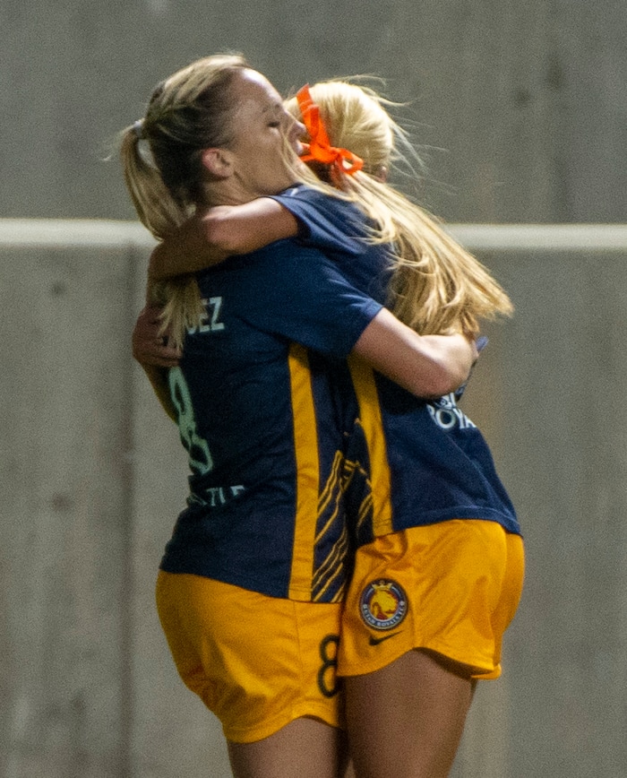 (Rick Egan | The Salt Lake Tribune) Utah Royals FC forward Amy Rodriguez (8) is congratulated by Utah Royals FC forward Brittany Ratcliffe (25) after scoring the first goal for the Ropyals, in soccer action between Utah Royals FC and Portland Thorns FC at Rio Tinto Stadium, on Saturday, Oct. 3, 2020.