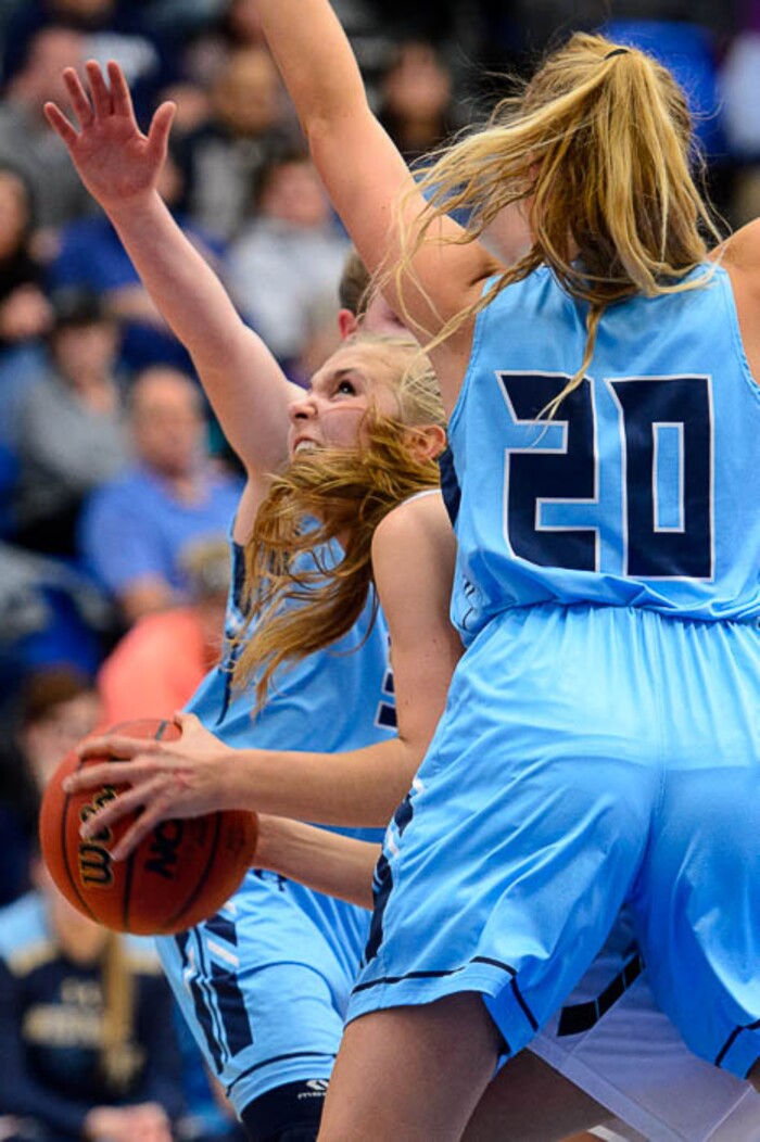 (Trent Nelson | The Salt Lake Tribune)  Hillcrest's Cara Snowder (12) defended by Westlake's Jillian Vance (20) as Hillcrest faces Westlake in the 6A High School Girls' Basketball Tournament at SLCC in Taylorsville, Thursday Feb. 22, 2018.