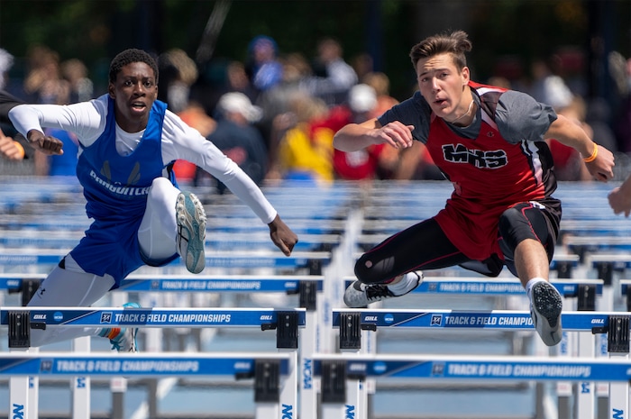(Rick Egan | The Salt Lake Tribune) Kolt Bonner, Panguitch, and tuck Davis Manila, compete in heat 1 of the Boys 11 Meter hurdles at the Utah State Track Meet in Provo, on Friday, May 20, 2022.
