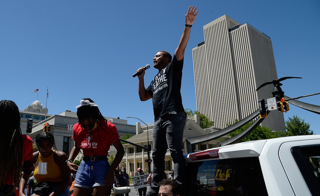 (Francisco Kjolseth  |  The Salt Lake Tribune) Trey Barnes with Solidarity for Justice talks to to demonstrators as they march the streets of downtown Salt Lake City for a protest as part of a series of Juneteenth celebrations on Friday, June 19, 2020.