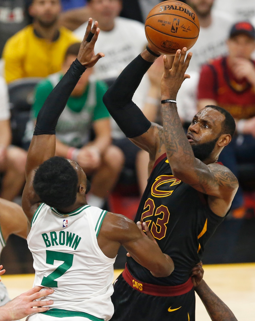 Cleveland Cavaliers' LeBron James (23) shoots over Boston Celtics' Jaylen Brown (7) during the first half of Game 6 of the NBA basketball Eastern Conference finals Friday, May 25, 2018, in Cleveland. (AP Photo/Ron Schwane)