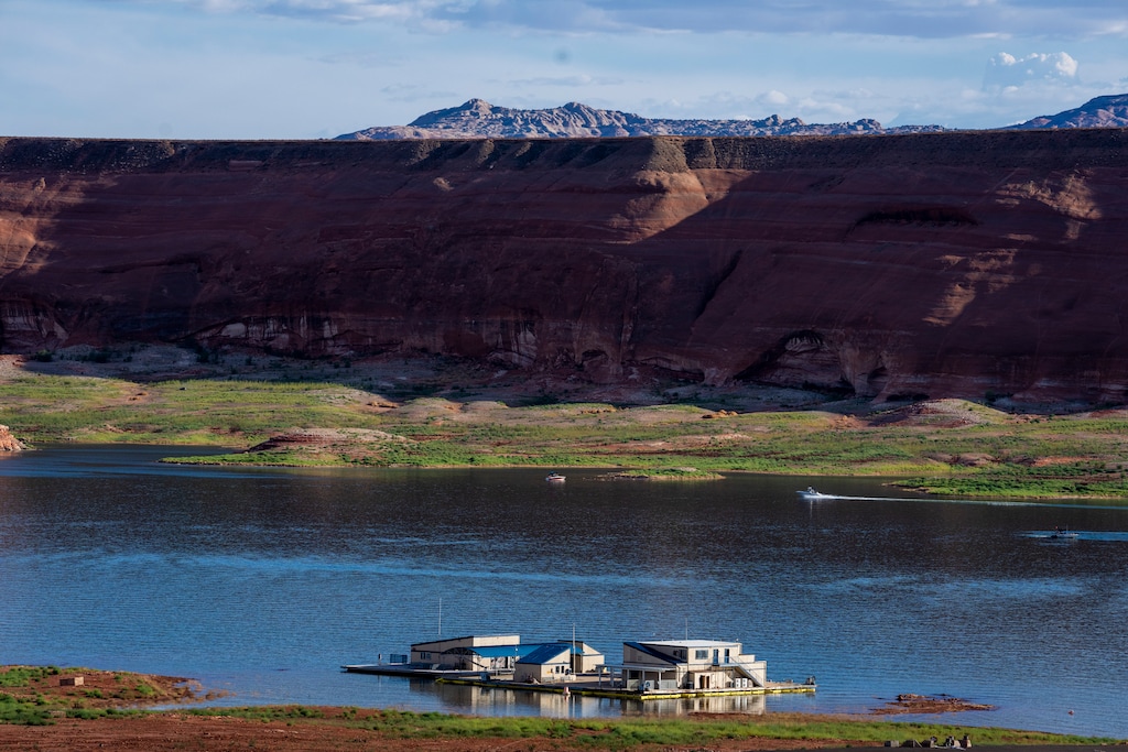 (Rick Egan | The Salt Lake Tribune) Houseboats moored at Bullfrog Marina on Lake Powell, on Wednesday, July 13, 2022. There has been almost no movement on a proposed pipeline that would divert 86,000 acre-feet of the Colorado River's flow to St. George.