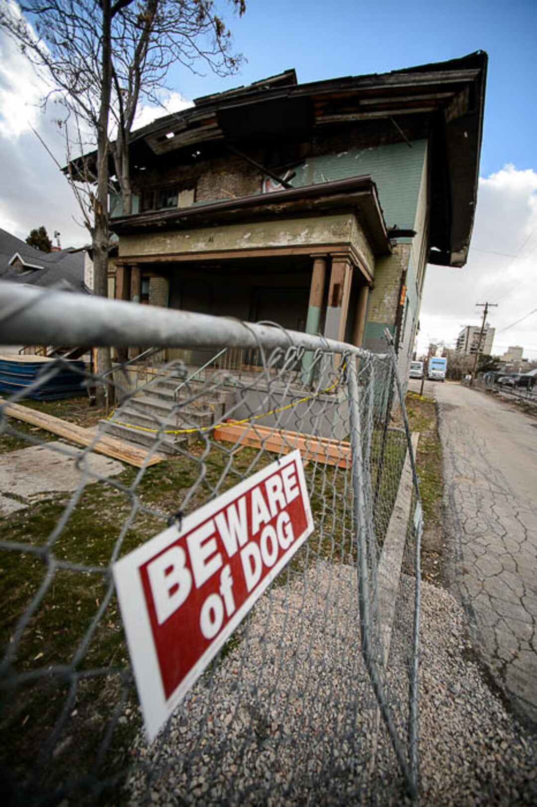 (Trent Nelson | The Salt Lake Tribune)  A dilapidated, fire-damaged building near 100 South 700 East in Salt Lake City, Thursday Feb. 15, 2018. Other Side Academy has received approval to demolish it for their expansion.