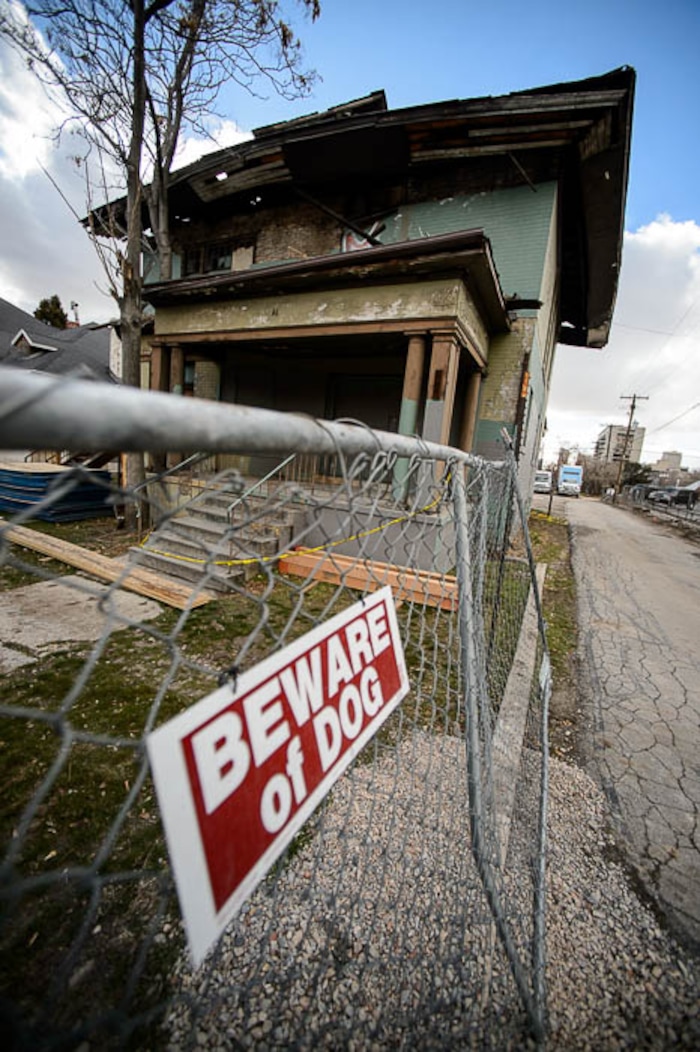 (Trent Nelson | The Salt Lake Tribune) A dilapidated, fire-damaged building near 100 South 700 East in Salt Lake City, Thursday Feb. 15, 2018. Other Side Academy has received approval to demolish it for their expansion.