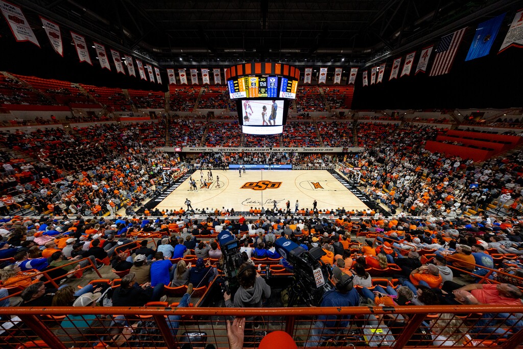 Oklahoma State and BYU fans in the stands in the second half of an NCAA college basketball game, Wednesday, Feb. 4, 2026 in Stillwater, Okla. (AP Photo/Mitch Alcala)