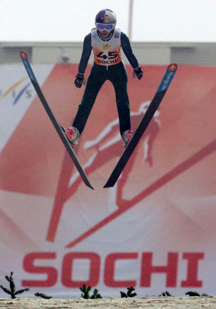 Sarah Hendrickson of the US, makes her trial jump, during the Women's Normal Hill Individual event at the FIS Ski jumping Cup in Sochi, Russia, Saturday, Dec. 8, 2012. (AP Photo/Dmitry Lovetsky)