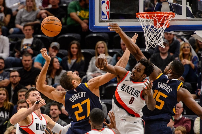 (Trent Nelson | The Salt Lake Tribune)  Utah Jazz center Rudy Gobert (27) puts up a shot, blocked by Portland Trail Blazers forward Al-Farouq Aminu (8) as the Utah Jazz host the Portland Trail Blazers, NBA basketball in Salt Lake City, Wednesday November 1, 2017.
