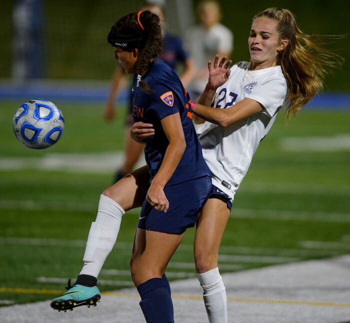 (Steve Griffin | The Salt Lake Tribune) Timpview 's Natalie Rivera, left, keeps the ball away from Timpanogos forward Kara Hartle during their 5A semifinal girl's soccer match at Juan Diego High School in Draper Tuesday October 17, 2017.