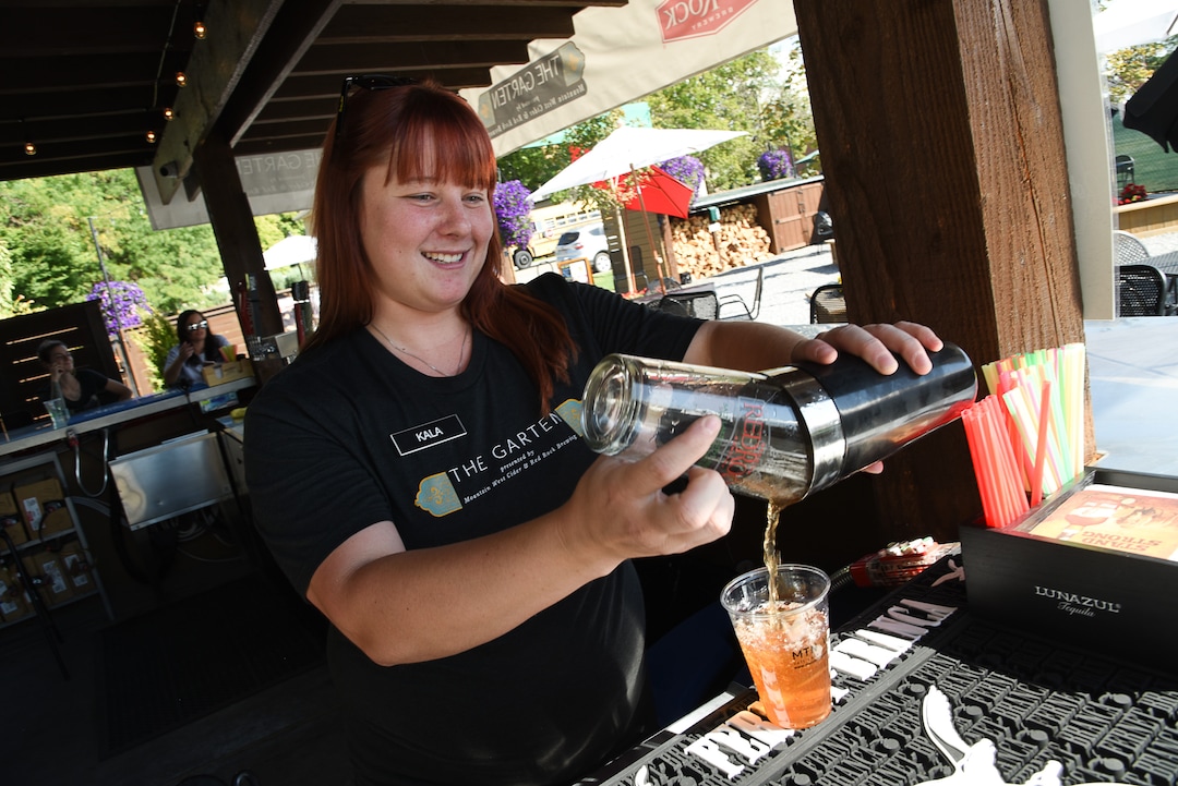 (Francisco Kjolseth  |  The Salt Lake Tribune)  Kala Rae pours a drink at The Garten recently. Jeff and Jennifer Carleton, owners of The Garten, a new German-inspired beer garden in Salt Lake City are having a difficult time getting a permanent liquor license from the DABC.  They don't qualify for a restaurant liquor license, because the venue doesnÕt have an on-site kitchen. They were denied a reception center license because they need to serve more than just offerings from food trucks.  A bar license is an option, but the CarletonÕs would prefer to keep The Garten an all-ages venue, so that parents can bring their minor children. Right now they are operating on special event permits.