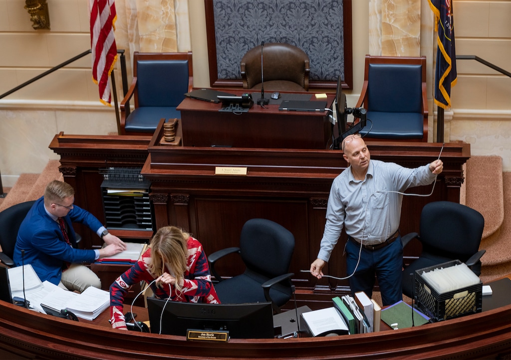 (Rick Egan | The Salt Lake Tribune)  Workers prepare the Senate Chamber for the upcoming legislative session on Wednesday, Jan. 11, 2023.