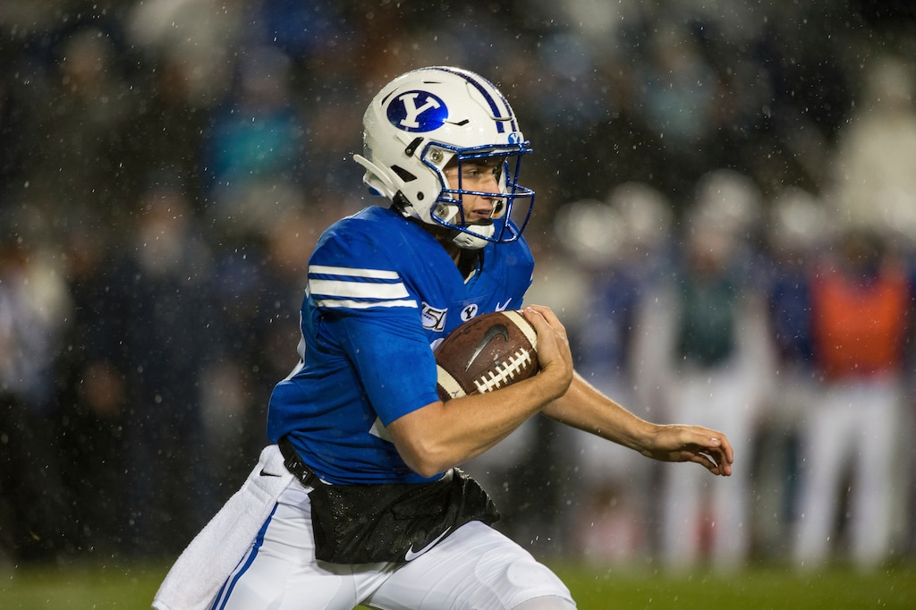 (Tyler Tate | The Associated Press) BYU quarterback Baylor Romney runs during the first half of the team's NCAA college football game against Boise State on Saturday, Oct. 19, 2019, in Provo, Utah.