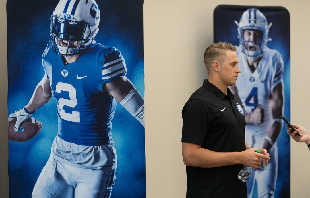 (Francisco Kjolseth | The Salt Lake Tribune) Quarterback Baylor Romney is interviewed by print media during BYU football media day in the BYU Broadcasting Building in Provo on Thursday, June 17, 2021.