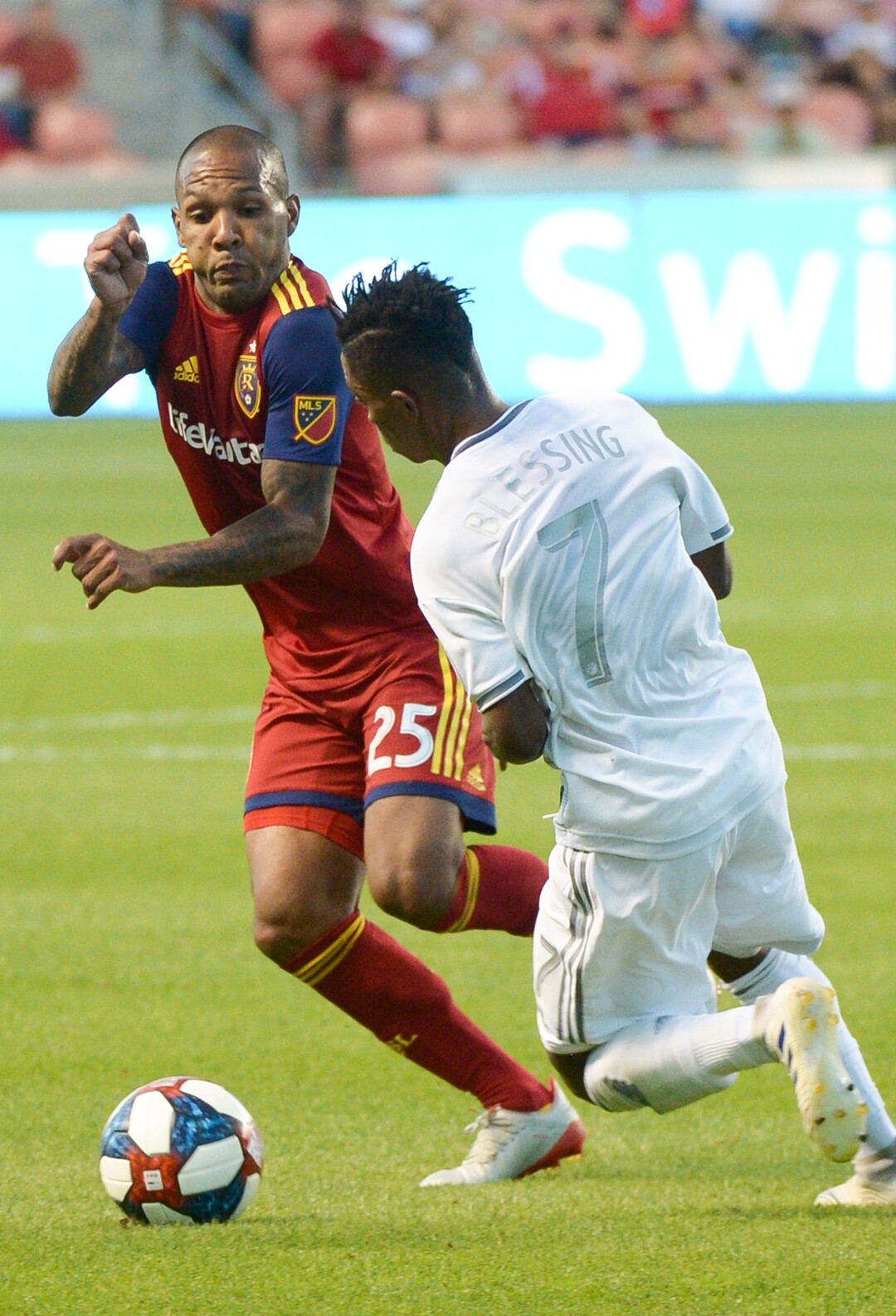 (Leah Hogsten  |  The Salt Lake Tribune) Real Salt Lake midfielder Everton Luiz (25) battles Los Angeles FC forward Latif Blessing (7) as Real Salt Lake hosts Los Angeles Football Club in the fourth round of the Lamar Hunt U.S. Open Cup, June 11, 2019 at Rio Tinto Stadium in Sandy.