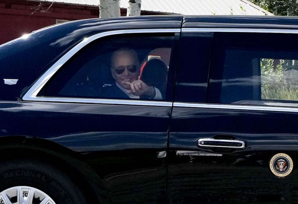 (Francisco Kjolseth | The Salt Lake Tribune) President Joe Biden acknowledges supporters as his motorcade passes through the Park City area following a private fundraiser on Thursday, Aug 10, 2023. All of Utah's U.S. House members voted to open an impeach inquiry into Biden on Wednesday.