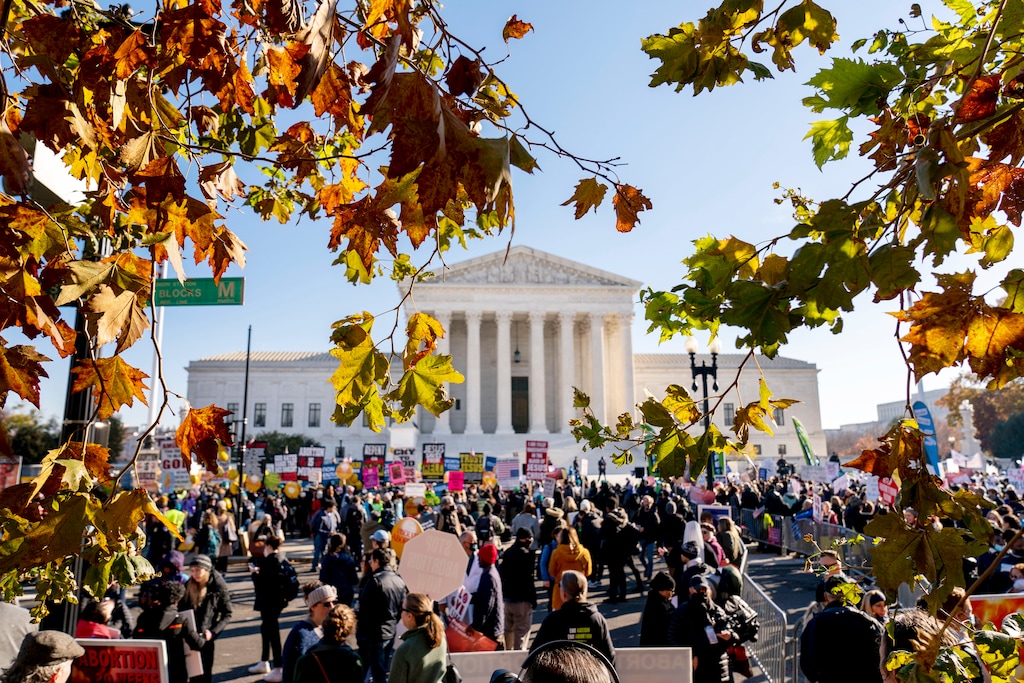 (Andrew Harnik | AP) Abortion rights advocates and anti-abortion protesters demonstrate in front of the U.S. Supreme Court, Wednesday, Dec. 1, 2021, in Washington, as the court hears arguments in a case from Mississippi, where a 2018 law would ban abortions after 15 weeks of pregnancy, well before viability.