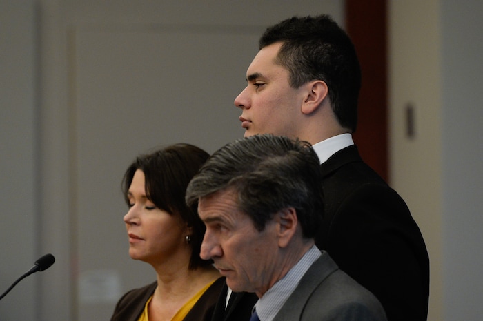 (Francisco Kjolseth  |  The Salt Lake Tribune)  Former Brighton High and University of Southern California linebacker Osa Masina, center, is joined by his defense attorney's Greg and Rebecca Skordas during his sentencing for sexual battery at the Matheson Courthouse in Salt Lake City on Tuesday, Dec. 5, 2017. Masina was sentenced to 365 days in jail, followed by two years on probation.
