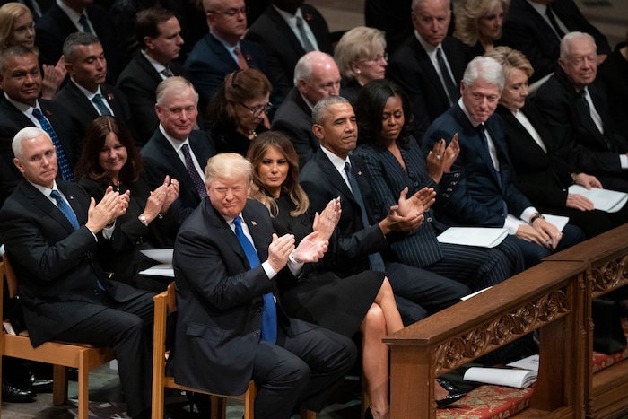 President Donald Trump, first lady Melania Trump, former President Barack Obama, Michelle Obama, former President Bill Clinton, former Secretary of State Hillary Clinton, former President Jimmy Carter, former applaud during a State Funeral for former President George H.W. Bush at the National Cathedral, Wednesday, Dec. 5, 2018, in Washington. In the second row are Vice President Mike Pence, and his wife Karen Pence, former Vice President Dan Quayle, and his wife Marilyn Quayle and former Vice President Dick Cheney and his wife Lynn Cheney, former Vice President Joe Biden and his wife Jill Biden (AP Photo/Carolyn Kaster)
