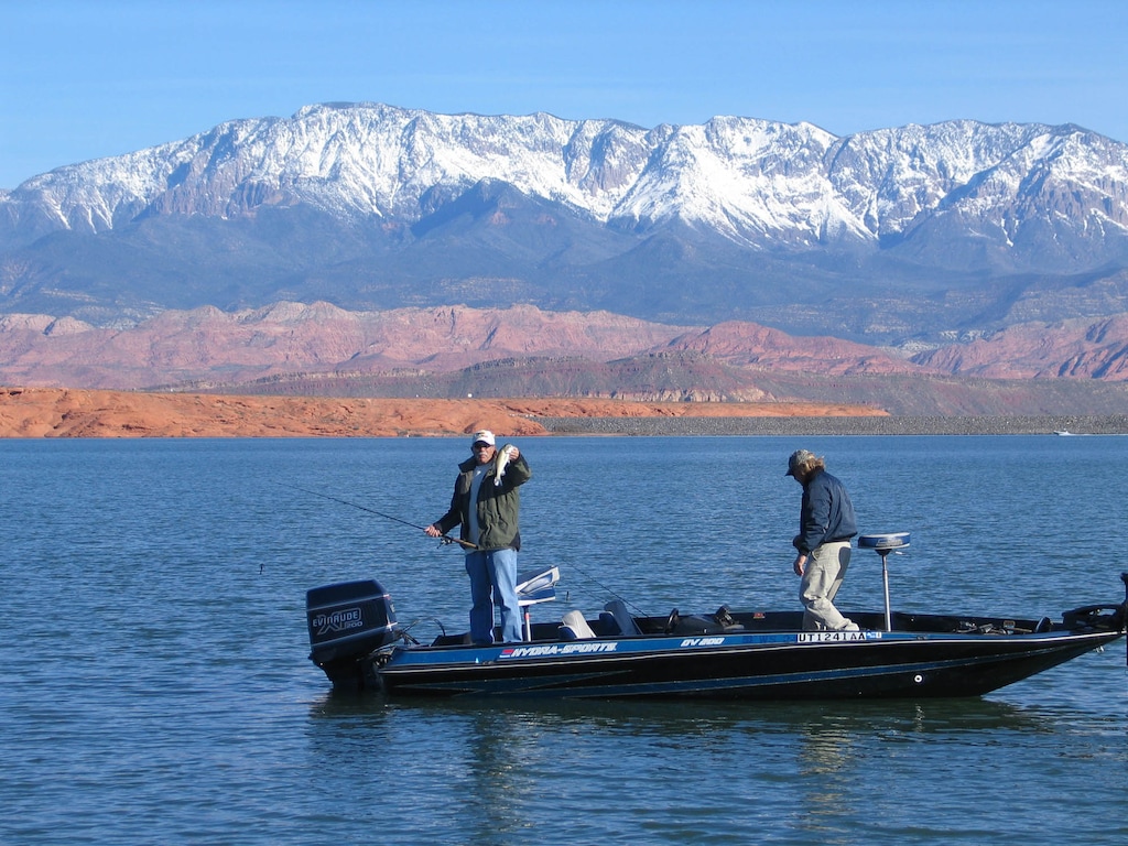 (Tribune file photo) Anglers fish for largemouth bass at Sand Hollow Reservoir.