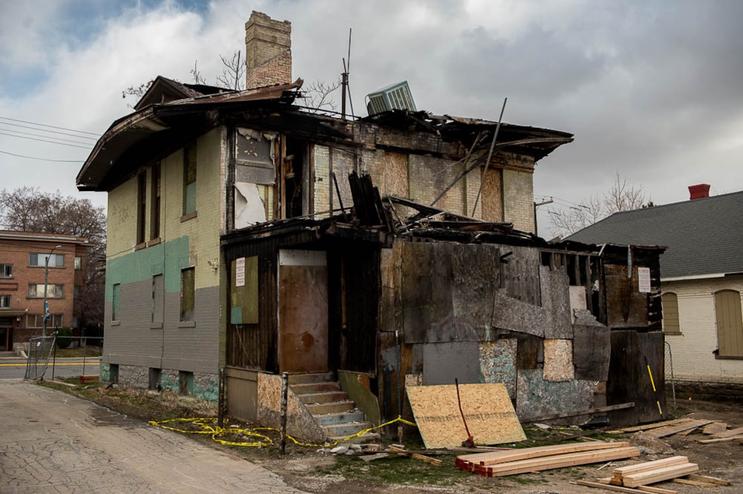 (Trent Nelson | The Salt Lake Tribune)  A dilapidated, fire-damaged building near 100 South 700 East in Salt Lake City, Thursday Feb. 15, 2018. Other Side Academy has received approval to demolish it for their expansion.