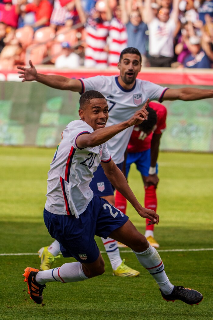 (Trent Nelson  |  The Salt Lake Tribune) United States defender Reggie Cannon celebrates a goal as the U.S. Men’s National Team (USMNT) faces Costa Rica in a friendly at Rio Tinto Stadium in Sandy on Wednesday, June 9, 2021. At rear is United States midfielder Sebastian Lletget.