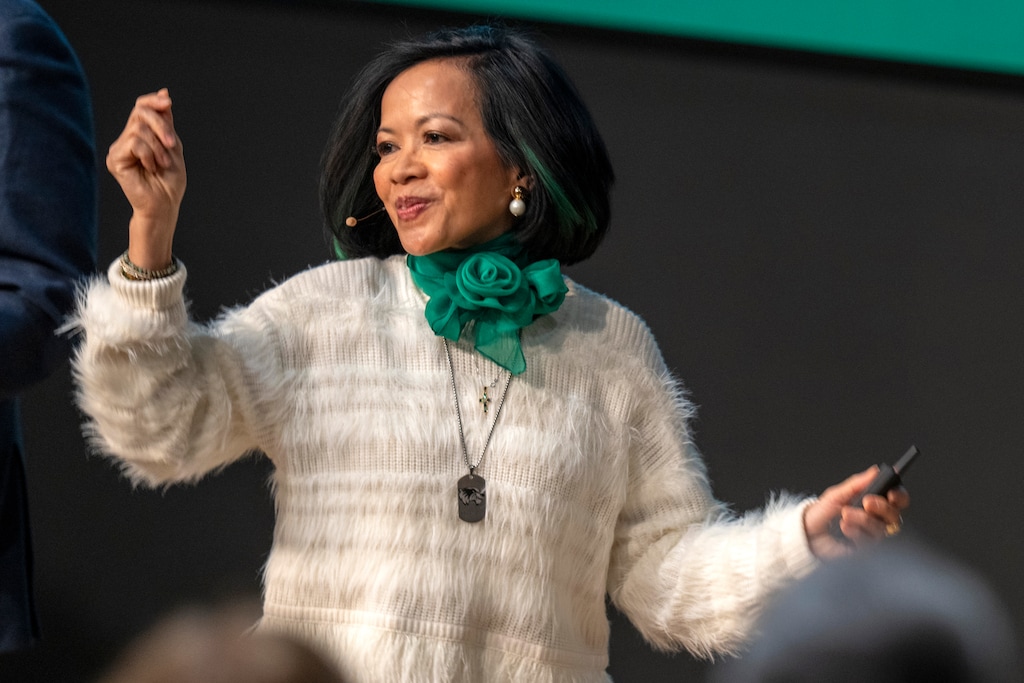 (Rick Egan | The Salt Lake Tribune) UVU President Astrid Tuminez enters the stage dancing to Bruce Springsteen before delivering her annual "State of the University" address in the Keller Ballroom on Wednesday, Jan 14, 2026.

