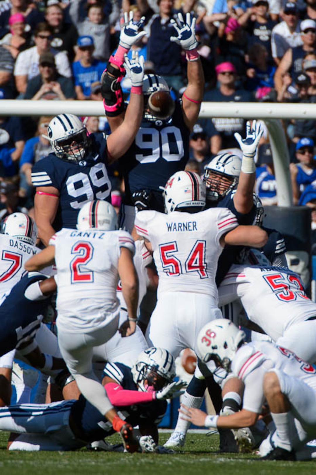 (Trent Nelson | The Salt Lake Tribune)  BYU defenders leap in an attempt to block a field goal by Northern Illinois Huskies place kicker Andrew Gantz (2) as BYU hosts Northern Illinois, NCAA football in Provo, Saturday Oct. 27, 2018. The kick was no good.