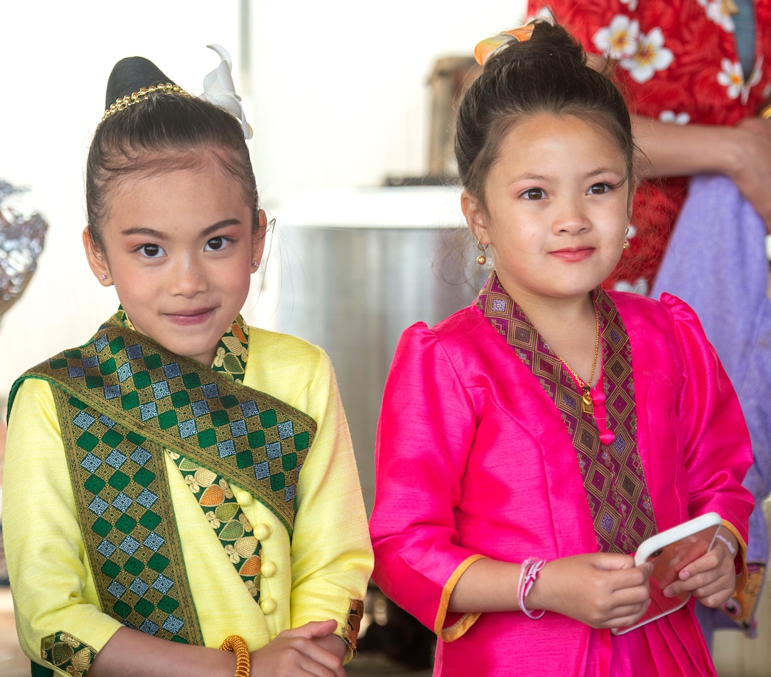 (Rick Egan  |  The Salt Lake Tribune)   Kandra 7, and Daisee  8, wear their traditional clothes for the Wat Lao Salt Lake Buddharam Utah, New Year Celebration, in West Valley City, Sunday, April 28, 2019.