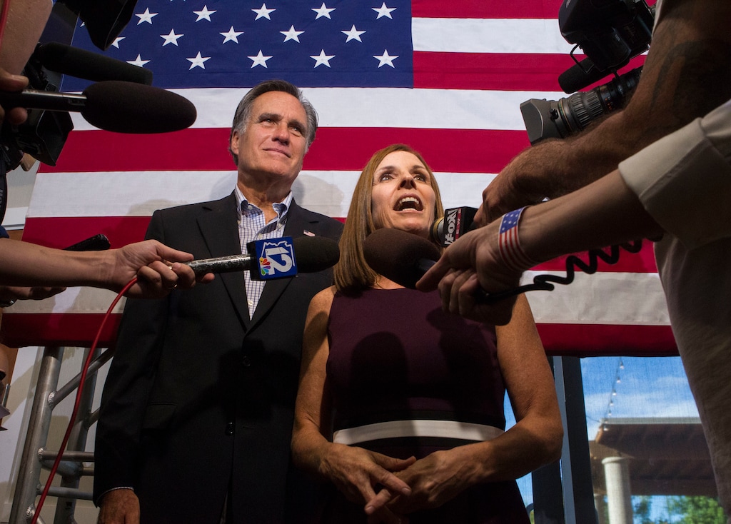 (Darryl Webb | The Associated Press) U.S. Rep. Martha McSally, R-Ariz., along with former Republican presidential nominee Mitt Romney, answers questions from the media during a Get Out the Vote rally at the Gilbert Falls Event Center, Friday, Oct. 12, 2018, in Gilbert, Ariz. McSally will face U.S. Rep. Kyrsten Sinema, D-Ariz., in the November election as they seek the seat of retiring U.S. Sen. Jeff Flake, R-Ariz.