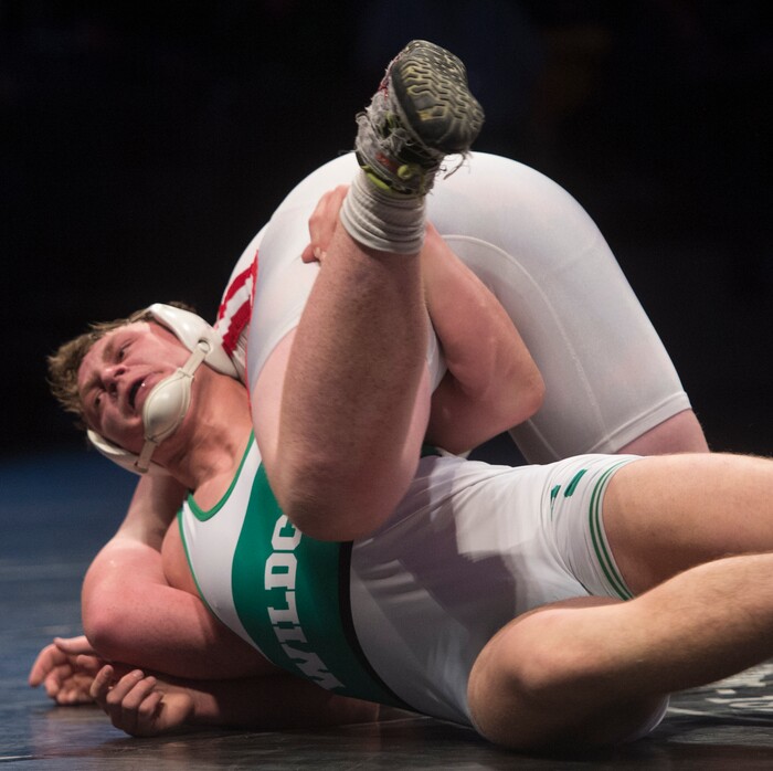 (Rick Egan  |  The Salt Lake Tribune)   Porter Fox (South Summit) wrestles Bradden Davis (Delta) in the 285 weight class,  Fox won the match (Dec 5-3) in 3A State Wrestling at UVU in Orem, Saturday, February 10, 2018.