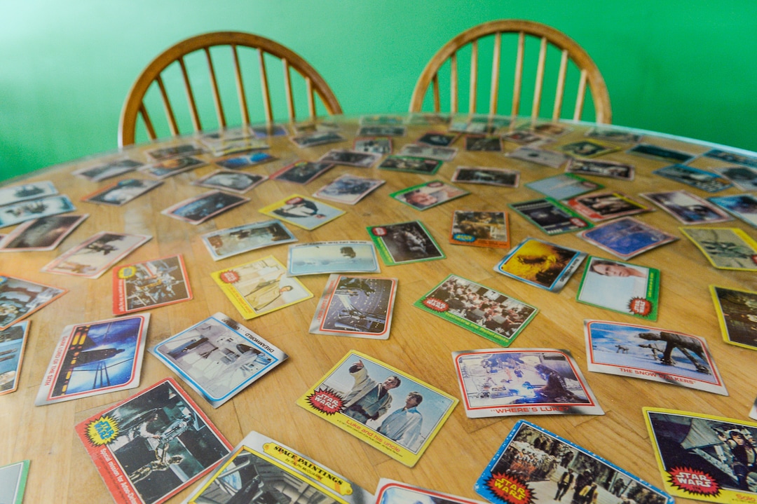 (Francisco Kjolseth  |  The Salt Lake Tribune)  "Star Wars" trading cards decorate a table at the Twin Suns Cafe in Sugar House.