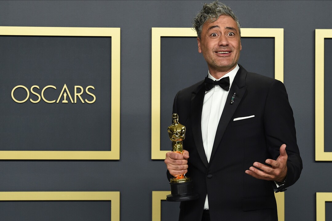 (Jordan Strauss | Invision/AP)  Taika Waititi, winner of the award for best adapted screenplay for "Jojo Rabbit", poses in the press room at the Oscars on Sunday, Feb. 9, 2020, at the Dolby Theatre in Los Angeles.