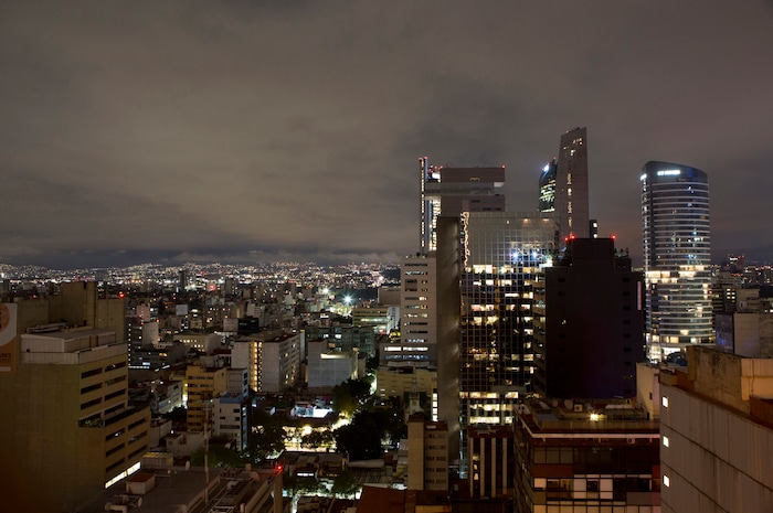 A general view of Mexico City after an earthquake, in the early morning hours of Friday, Sept. 8, 2017. A massive 8.1-magnitude earthquake hit off Mexico's southern coast, toppling houses in Chiapas state, causing at least three deaths and setting off a tsunami warning, officials said Friday.(AP Photo/Rebecca Blackwell)