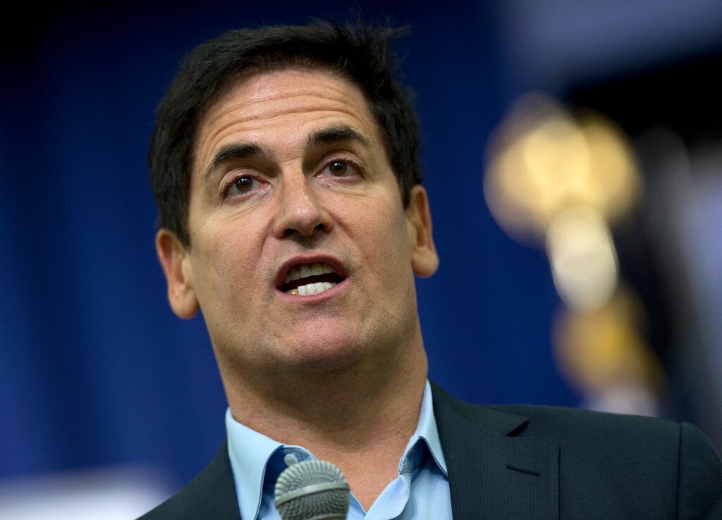FILE - In this May 11, 2015, file photo, Dallas Mavericks basketball team owner Mark Cuban answers questions from the audience before President Barack Obama spoke in the South Court Auditorium of the Eisenhower Executive Office Building on the White House complex in Washington. The NBA has fined Mark Cuban for commenting about the team's agreements with DeAndre Jordan and Wes Matthews during the league's free agent moratorium. NBA spokesman Tim Frank confirmed the penalty, which ESPN.com reported Tuesday, July 7, 2015,  was for $25,000. (AP Photo/Carolyn Kaster), File