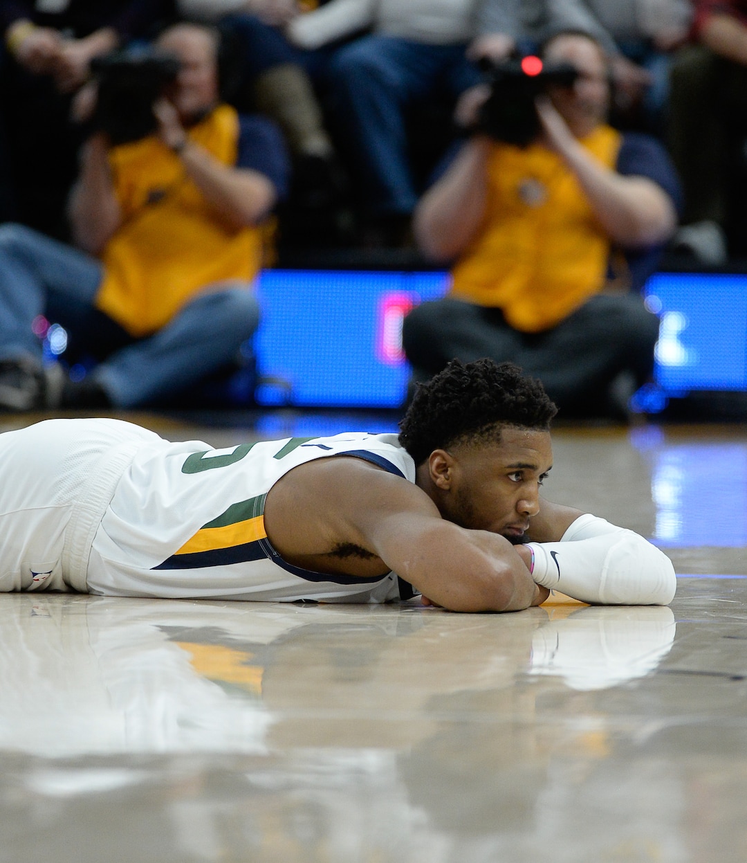 (Francisco Kjolseth  |  The Salt Lake Tribune) Utah Jazz guard Donovan Mitchell (45) lingers on the floor after losing the ball as the Utah Jazz host the Denver Nuggets in their NBA basketball game at Vivint Smart Home Arena in Salt Lake City on Wednesday, Feb. 5, 2020.