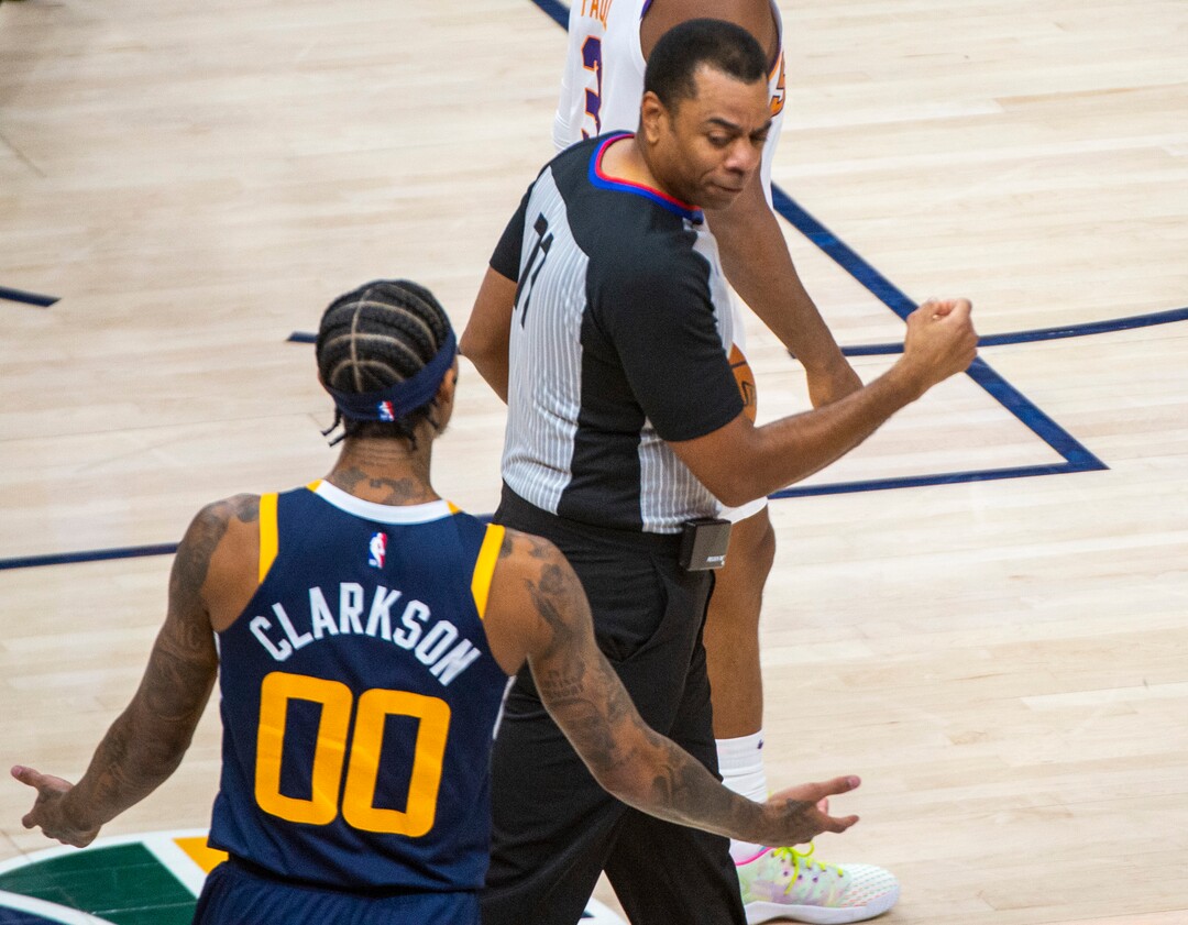(Rick Egan | The Salt Lake Tribune) Referee Karl Lane (77) calls a technical foul on Utah Jazz guard Jordan Clarkson (00), in NBA action between the Utah Jazz and the Phoenix Suns, on Thursday, Dec. 31, 2020.