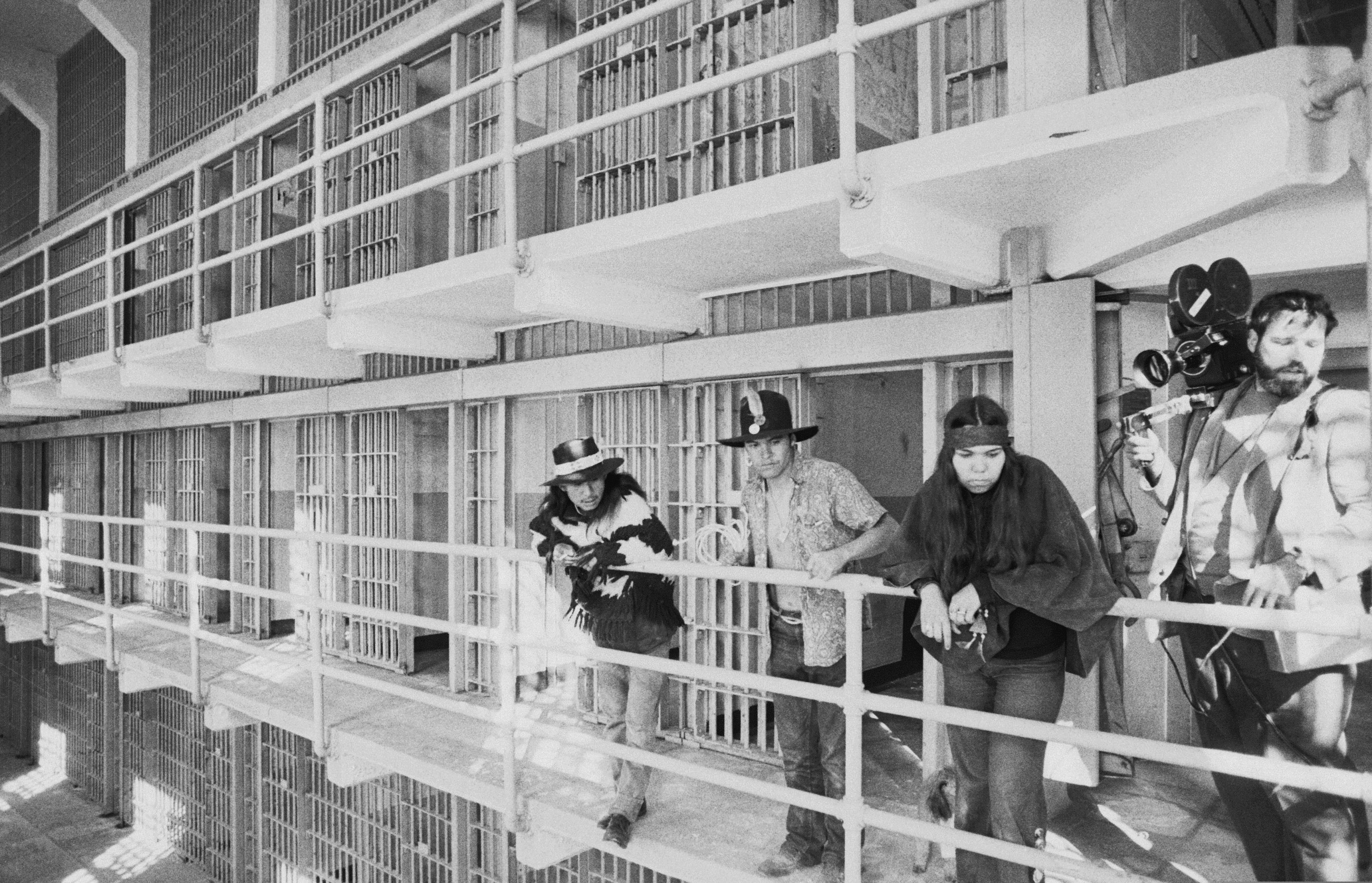 (RWK | AP file photo) In this Nov. 19, 1969, file photo, part of a band of Native Americans look over the main cell block of Alcatraz after occupying the island in San Francisco. The week of Nov. 18, 2019, marks 50 years since the beginning of a months-long Native American occupation at Alcatraz Island in the San Francisco Bay. The demonstration by dozens of tribal members had lasting effects for tribes, raising awareness of life on and off reservations, galvanizing activists and spurring a shift in federal policy toward self-determination.