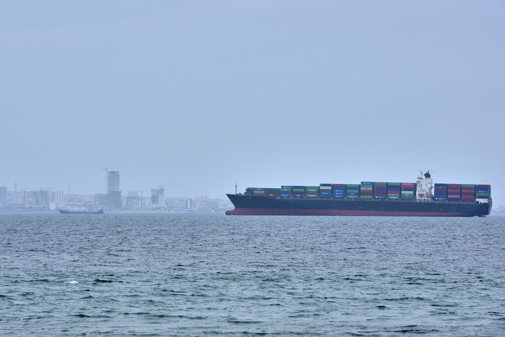 (Asghar Besharati | AP) A container ship is seen in the Strait of Hormuz off the coast of Qeshm Island, Iran, Saturday, April 18, 2026.