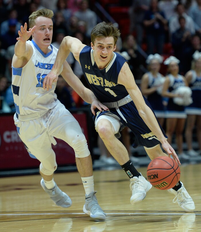 (Francisco Kjolseth  |  The Salt Lake Tribune)  Westlake vs Layton, 6A State high school basketball tournament at the Huntsman Center in Salt Lake City, Thursday March 1, 2018. Truman Brown (12), Jared McGregor (1). 