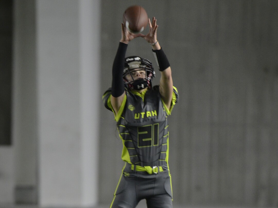 (Alex Vejar | The Salt Lake Tribune)  Rylee Taylor of Corner Canyon High leaps to catch a pass during a practice of the Utah Girls’ Tackle Football League on Wednesday, Jan. 22, 2020, at the Zions Bank Training Center in Herriman.