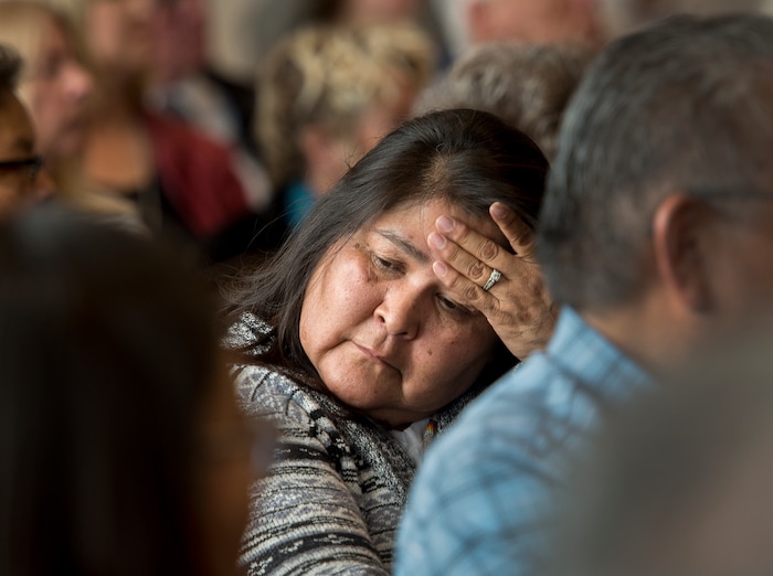 (Leah Hogsten  |  The Salt Lake Tribune)  JoAnn Black reacts to opposition to redistricting proposals during a hearing in Monticello on Thursday. The redistricting proposals would redraw voting districts to ensure significant American Indian majorities in two of three County Commission districts and on four of five school board voting districts as the result of a January 2012 lawsuit filed in U.S. District Court by the Navajo Nation. The lawsuit seeks the redrawing of voting districts to reflect the 2010 U.S. Census. Last year, U. S. District Court Judge Robert Shelby ruled the voting districts in the sprawling southeastern Utah county, which today is home to 16,895 residents, are unconstitutional and violate the rights of American Indians. He ordered the county to redraw them.
